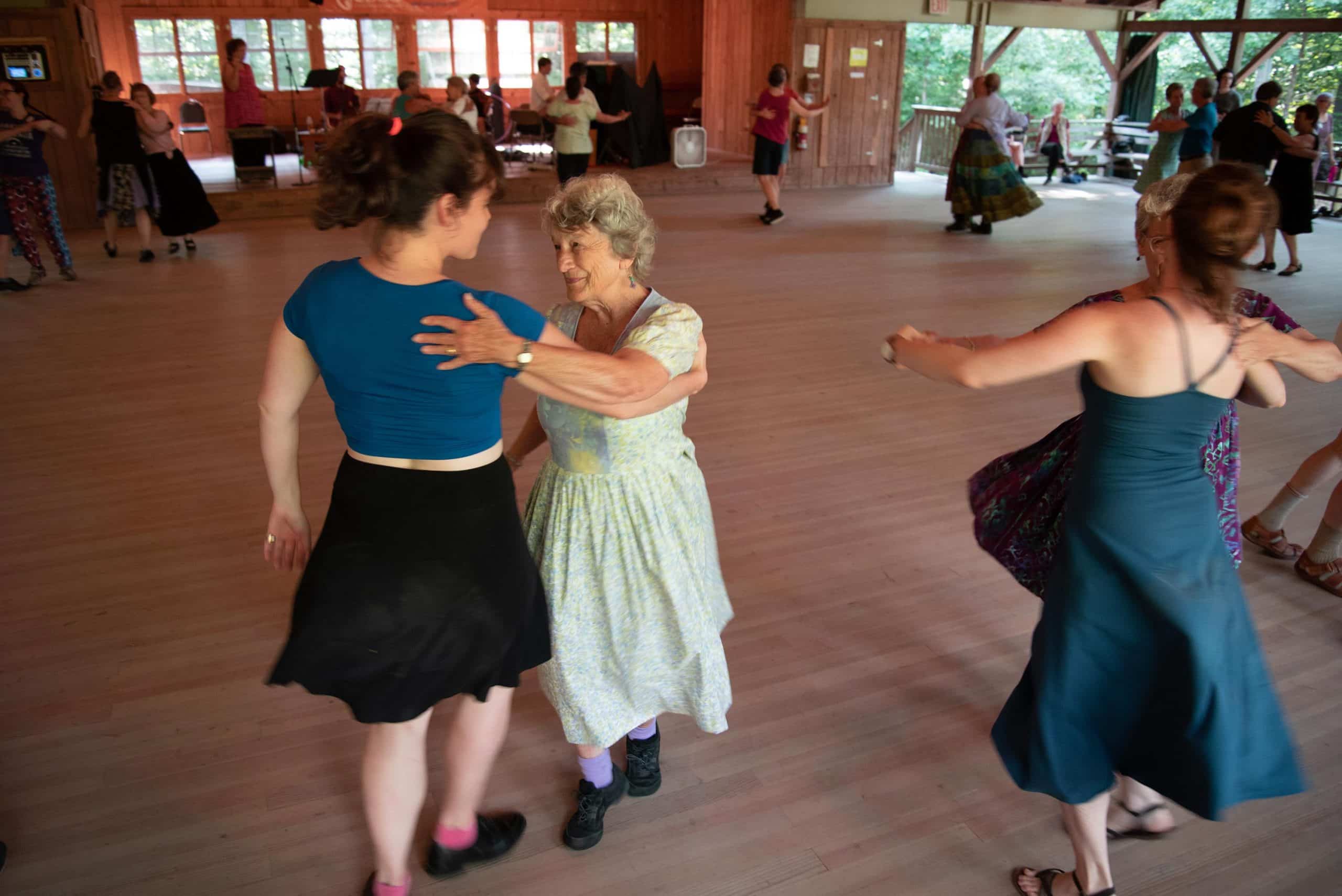 English country dancers with twirling skirts