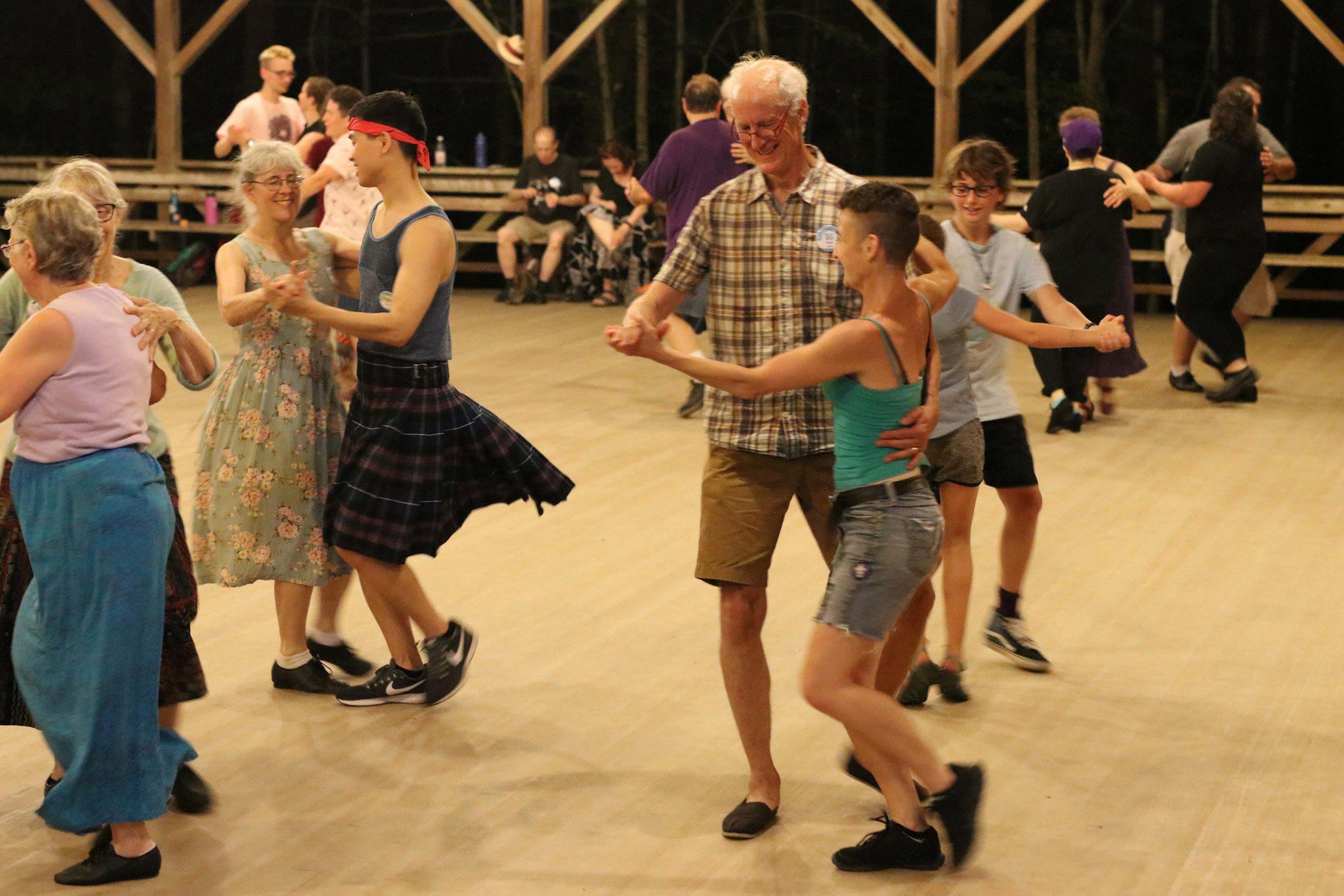 Dancers waltzing around the dance floor