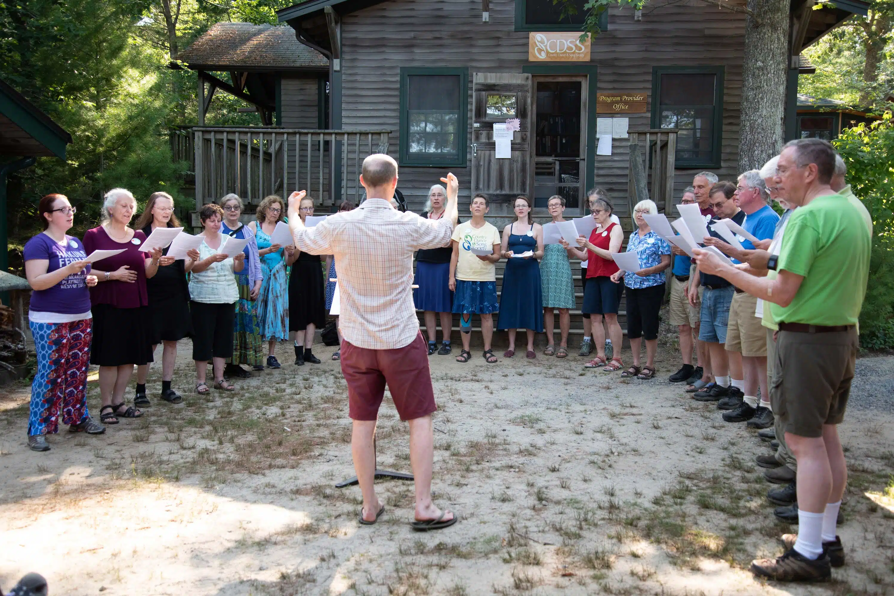 Singing in a large group outdoors