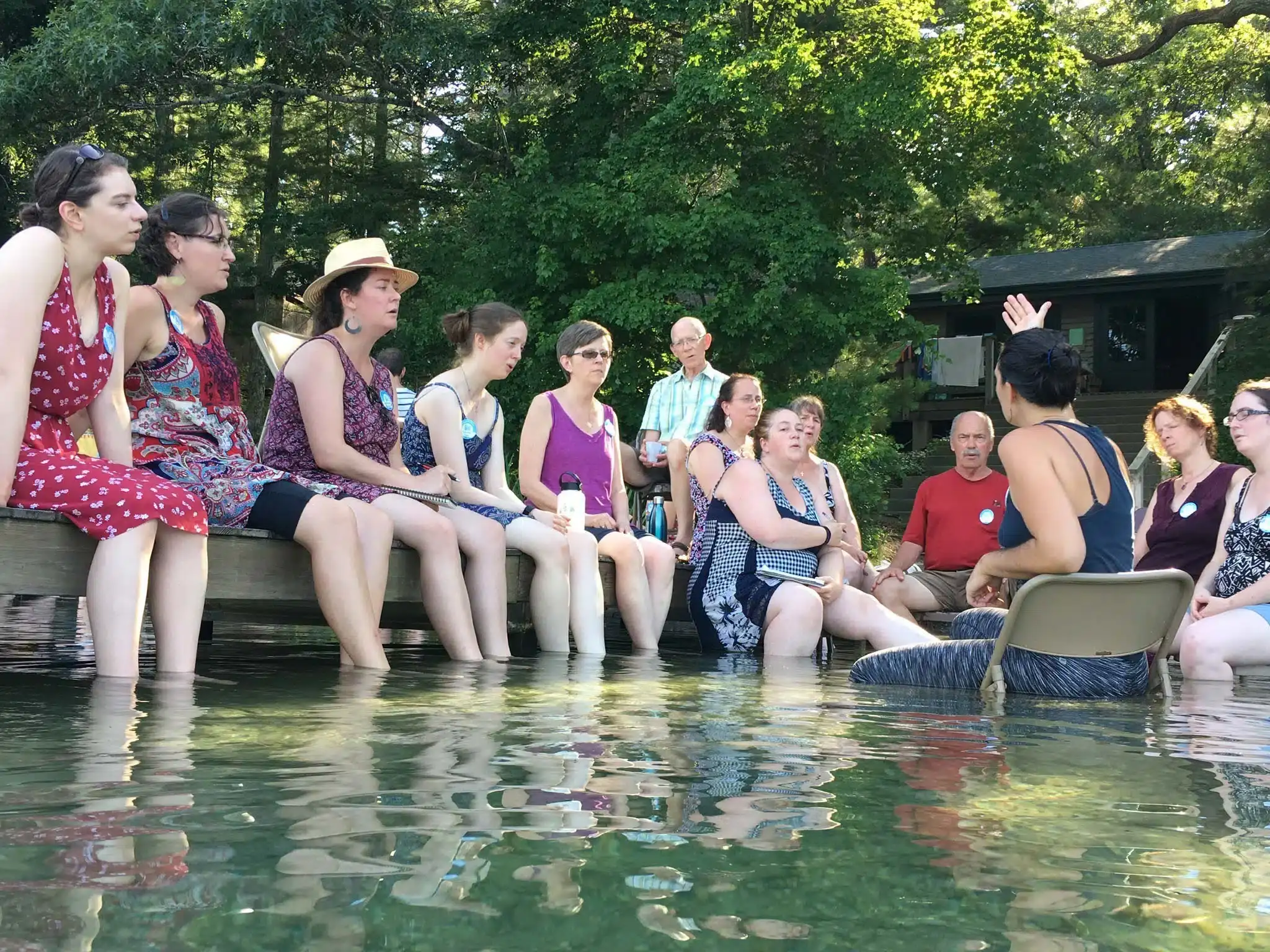Suzannah Park leads a singing class in the pond