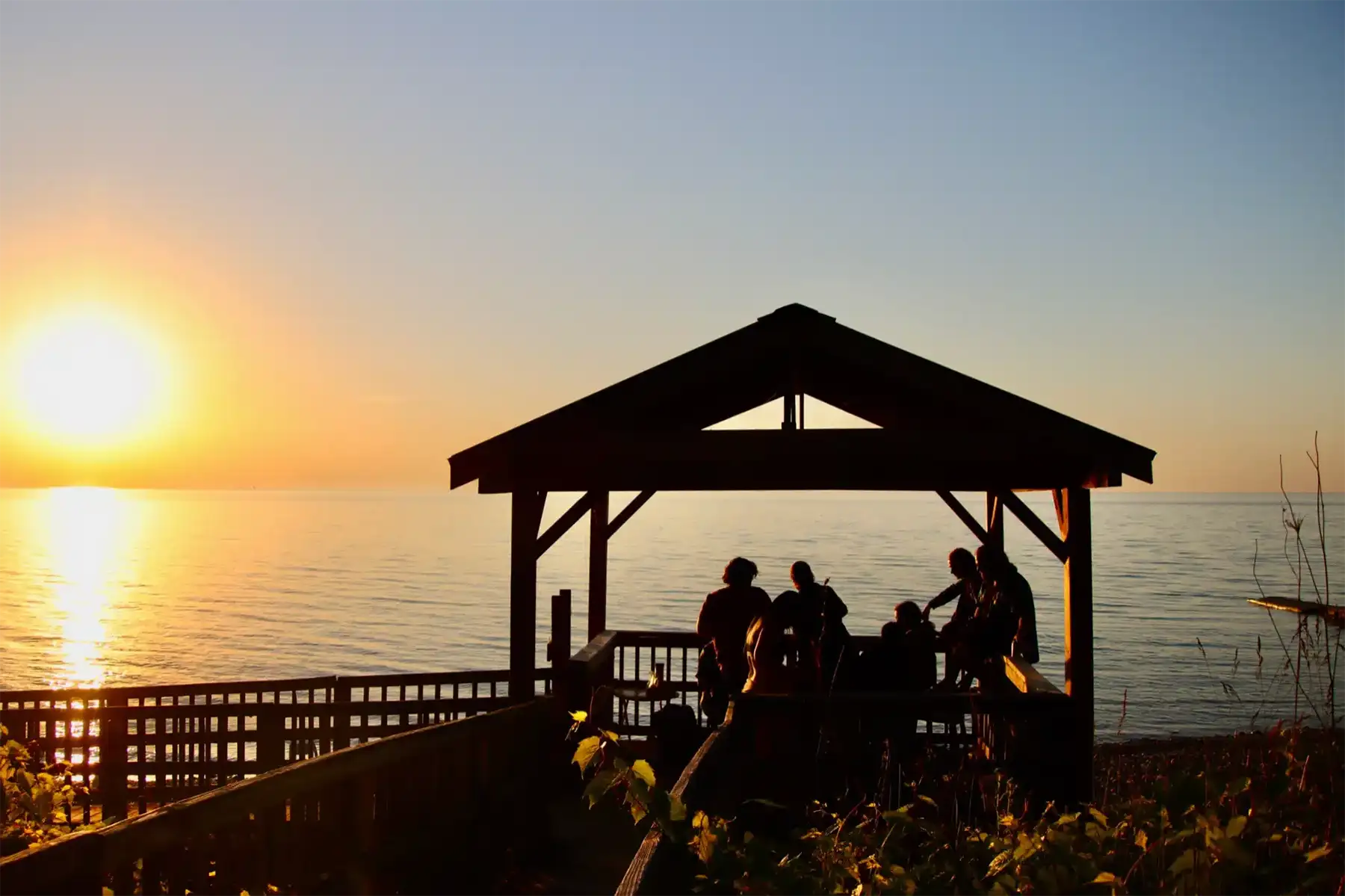 Dancers on the dock at sunset. Photo by Linda Lieberman.